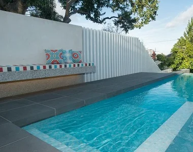 midnight bluestone drop face pool coping tiles, drop doqn pool coping pavers, blues tiles, dark tiles, black tile